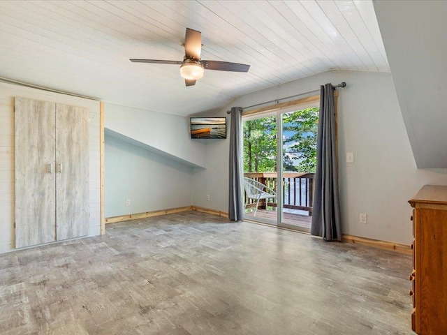 6274 Azalea Rd, Motley Twp, MN 56466 - unfurnished living room with vaulted ceiling, wood finished floors, ceiling fan, and baseboards