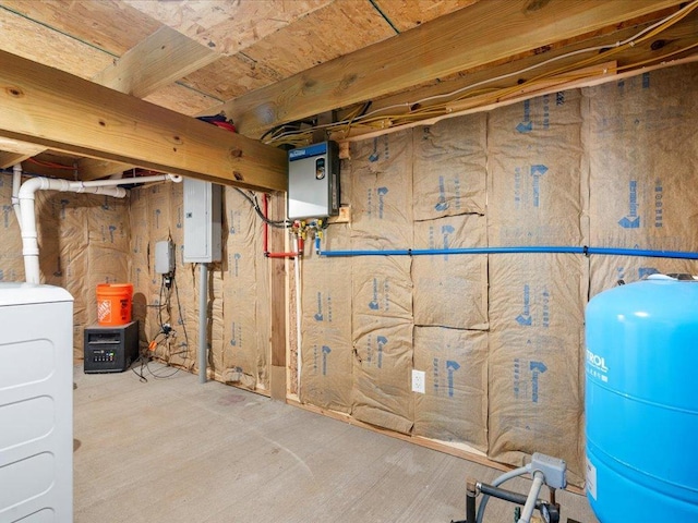 6274 Azalea Rd, Motley Twp, MN 56466 - unfinished below grade area with washer / clothes dryer, water heater, a water pressure tank, and electric panel