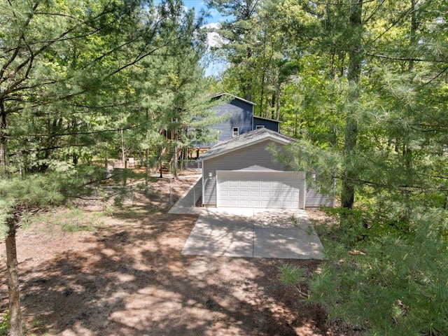 6274 Azalea Rd, Motley Twp, MN 56466 - view of home's exterior featuring a garage and driveway
