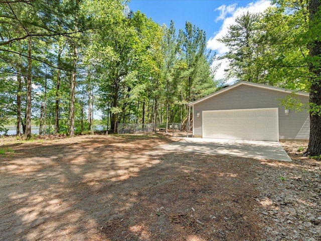 6274 Azalea Rd, Motley Twp, MN 56466 - view of yard featuring an outbuilding and a garage