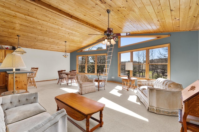 carpeted living area featuring baseboards, lofted ceiling with beams, a ceiling fan, and wooden ceiling