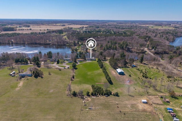 drone / aerial view featuring a water view and a rural view