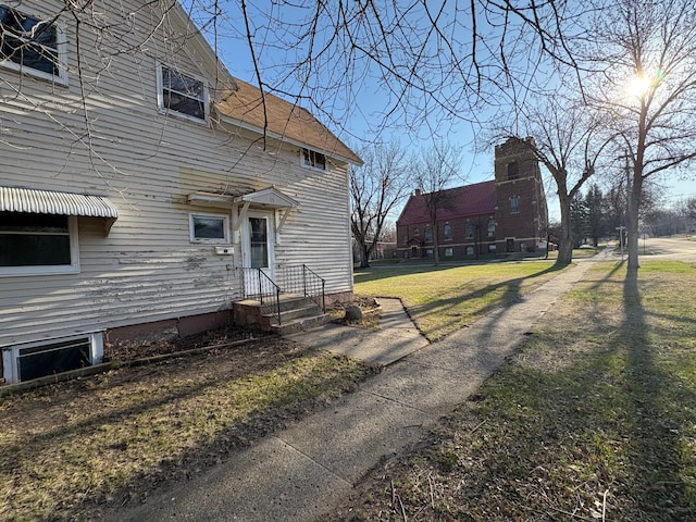 exterior space with a front lawn