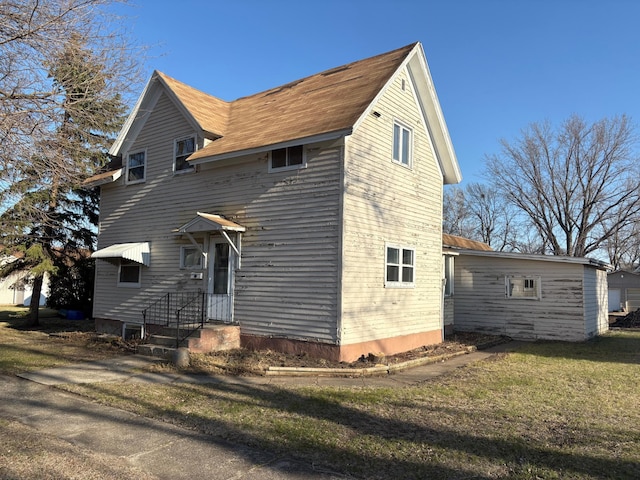 exterior space featuring a yard