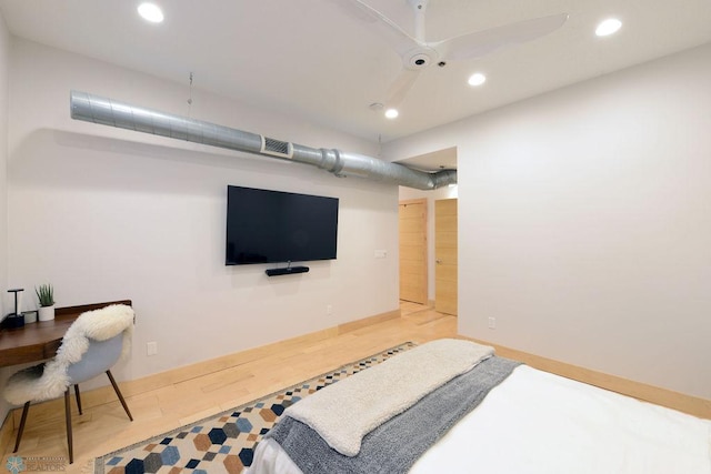 319 Broadway N Unit 202, Fargo, ND 58102 - bedroom featuring recessed lighting, ceiling fan, and wood finished floors