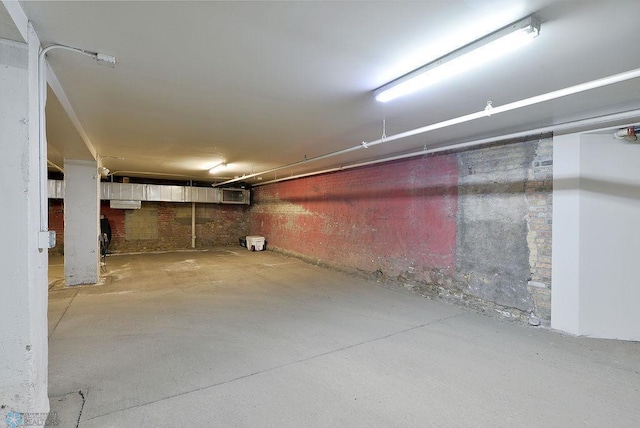 319 Broadway N Unit 202, Fargo, ND 58102 - unfinished basement with a wall mounted AC