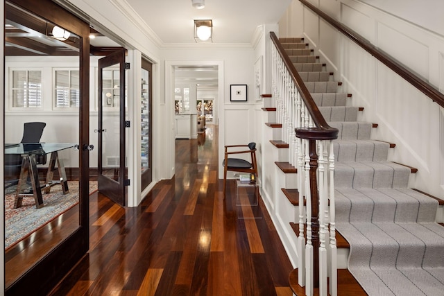 4812 Maple Rd, Edina, MN 55424 - staircase with wood finished floors, a decorative wall, ornamental molding, and french doors