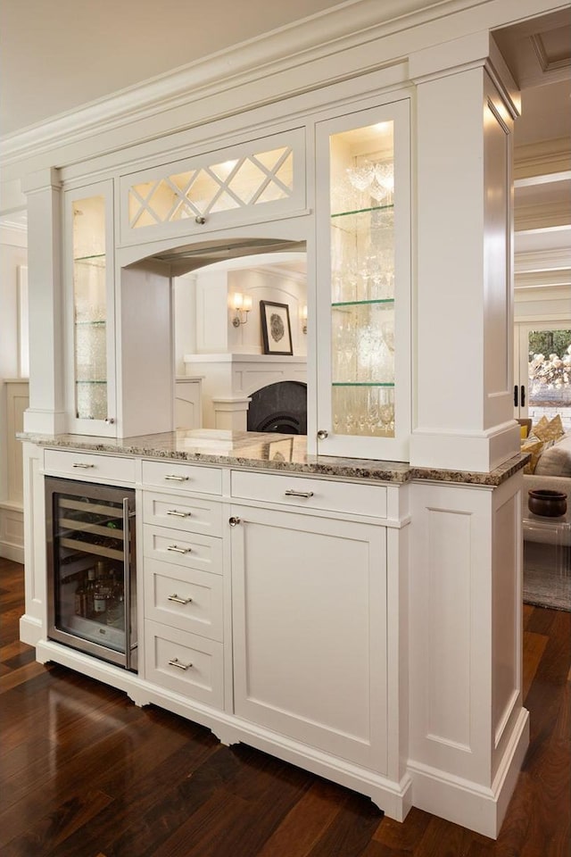 4812 Maple Rd, Edina, MN 55424 - bar with wine cooler, dark wood-style floors, and crown molding