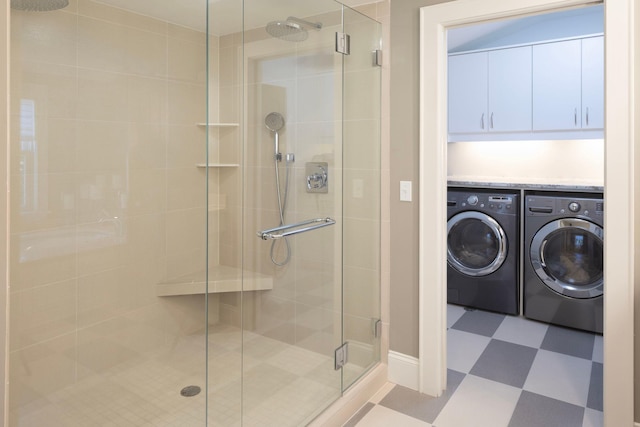 4812 Maple Rd, Edina, MN 55424 - full bathroom featuring tile patterned floors, washer and clothes dryer, and a stall shower