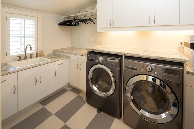 4812 Maple Rd, Edina, MN 55424 - laundry area with washing machine and clothes dryer, cabinet space, and light floors