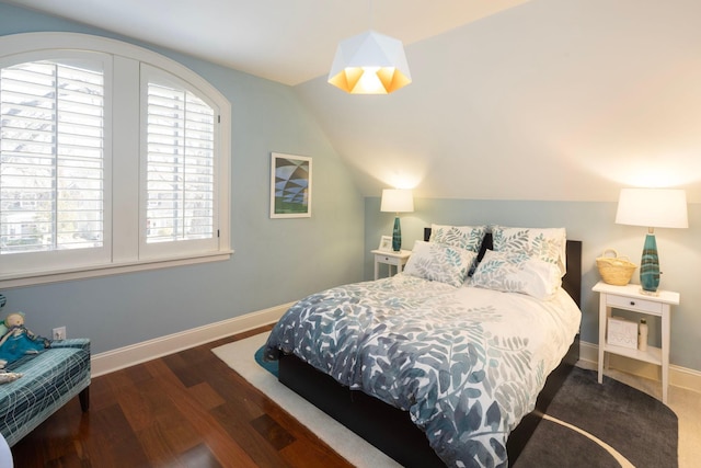 4812 Maple Rd, Edina, MN 55424 - bedroom featuring multiple windows, vaulted ceiling, baseboards, and wood finished floors
