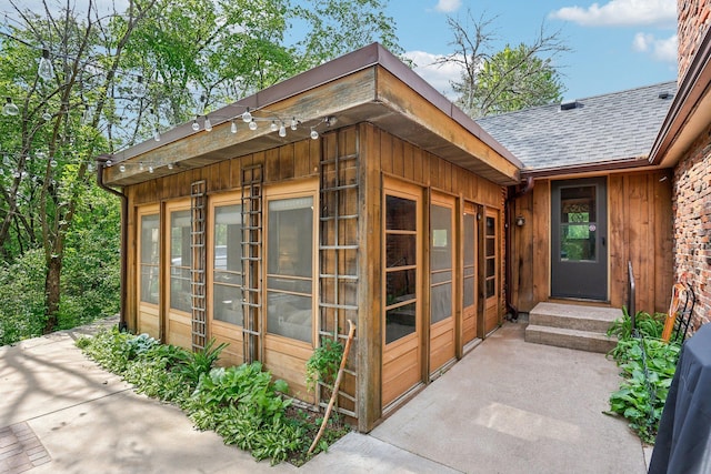 4810 Marystone Blvd NW, Andover, MN 55304 - entrance to property featuring a shingled roof and board and batten siding