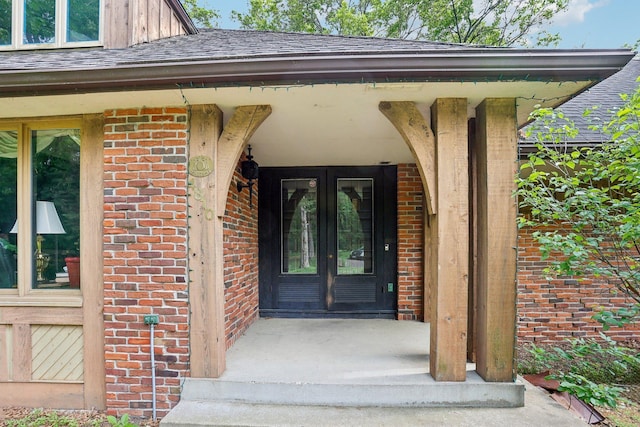 4810 Marystone Blvd NW, Andover, MN 55304 - property entrance with brick siding, french doors, and a shingled roof