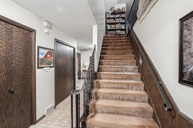 4810 Marystone Blvd NW, Andover, MN 55304 - stairs featuring a textured ceiling