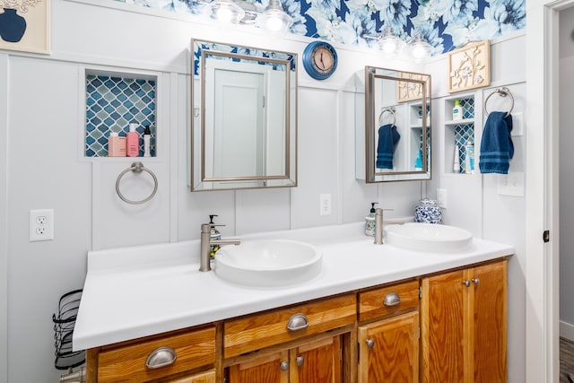 bathroom with double vanity and a sink