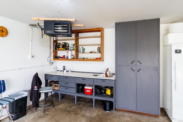 interior space featuring a heating unit and unfinished concrete floors