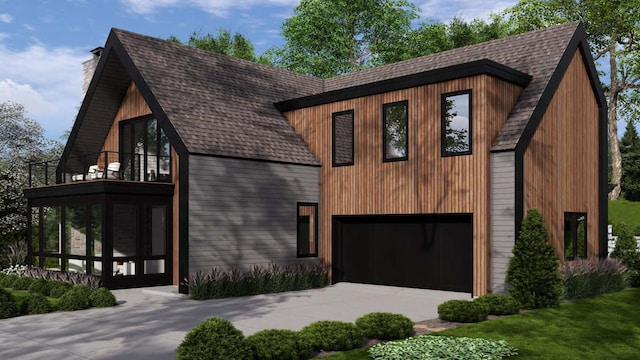 modern home featuring a balcony, concrete driveway, and a shingled roof