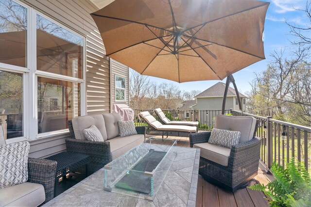 wooden deck with outdoor lounge area