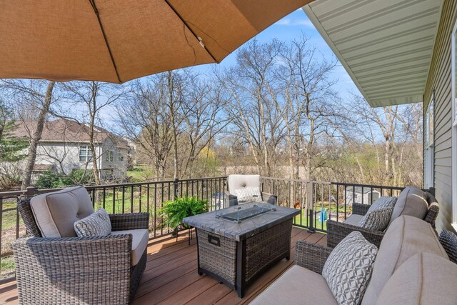 deck featuring outdoor lounge area