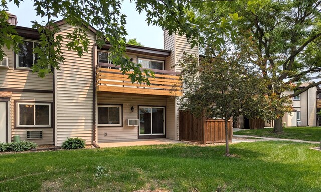 350 Ford Rd Unit 3, Saint Louis Park, MN 55426 - back of property featuring a balcony, a chimney, a patio area, and cooling unit