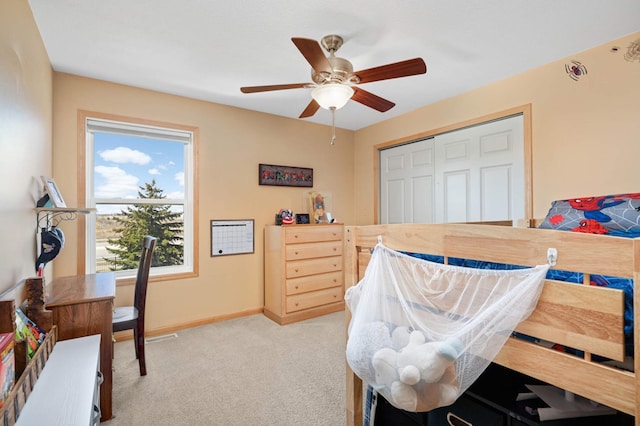 1810 Cherry Cir, Carver, MN 55315 - carpeted bedroom with a closet and a ceiling fan