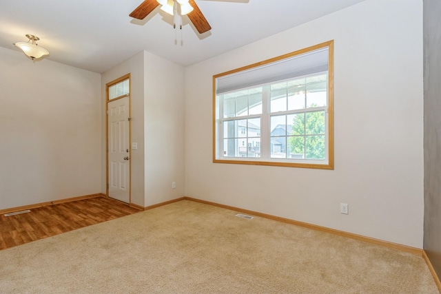 1810 Cherry Cir, Carver, MN 55315 - carpeted spare room featuring baseboards and ceiling fan