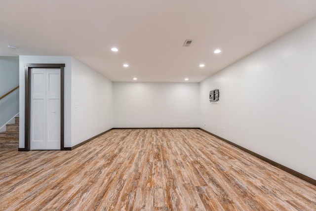 1810 Cherry Cir, Carver, MN 55315 - unfurnished room with recessed lighting, wood finished floors, stairway, and a smoke detector