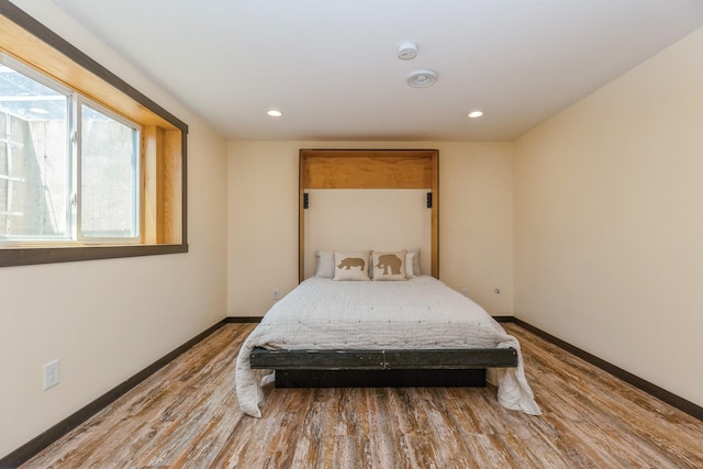1810 Cherry Cir, Carver, MN 55315 - bedroom featuring wood finished floors and recessed lighting