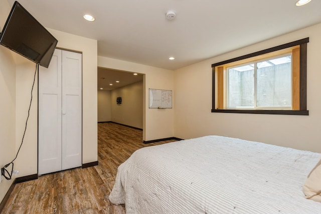 1810 Cherry Cir, Carver, MN 55315 - bedroom with wood finished floors, recessed lighting, and a closet