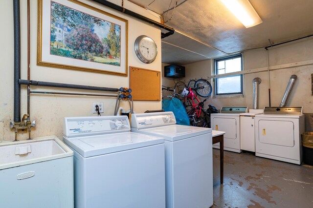 4415 Chowen Ave S Unit 201, Minneapolis, MN 55410 - clothes washing area featuring washer and dryer and a sink
