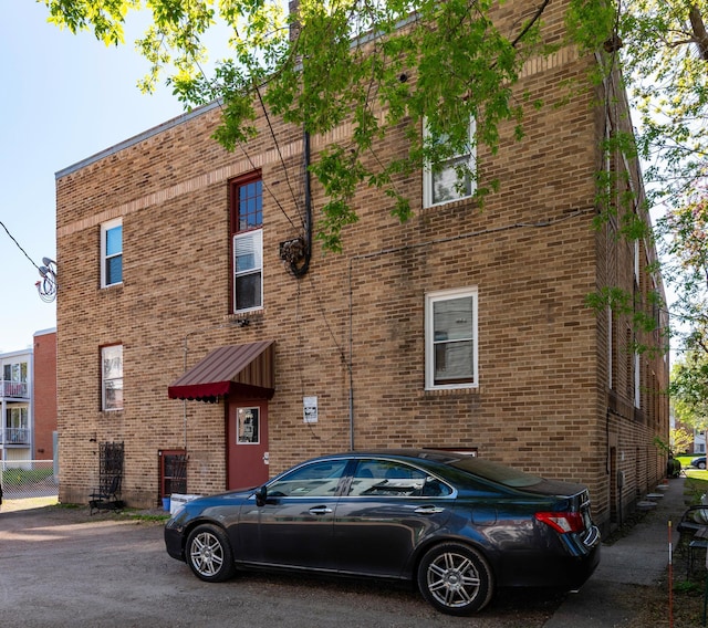 4415 Chowen Ave S Unit 201, Minneapolis, MN 55410 - back of house featuring brick siding
