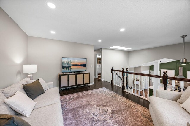 14445 Europa Ave, Apple Valley, MN 55124 - living area featuring wood finished floors, recessed lighting, and baseboards