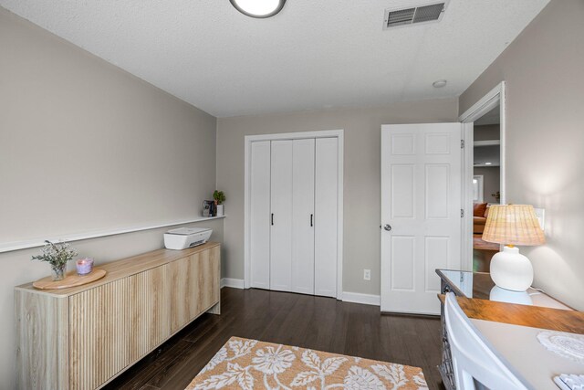 14445 Europa Ave, Apple Valley, MN 55124 - home office featuring dark wood finished floors and baseboards