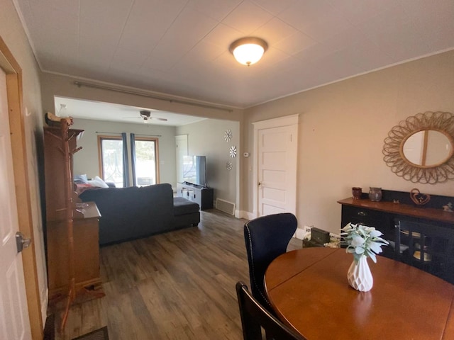 302 Church St, Saint Leo, MN 56264 - dining room with wood finished floors, ceiling fan, and crown molding
