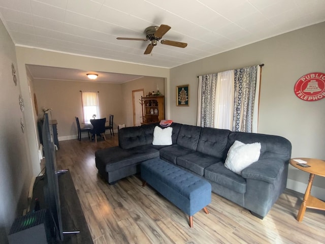 302 Church St, Saint Leo, MN 56264 - living area with baseboards, wood finished floors, and ceiling fan