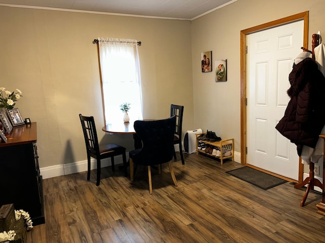 302 Church St, Saint Leo, MN 56264 - dining space with baseboards, dark wood-type flooring, and crown molding