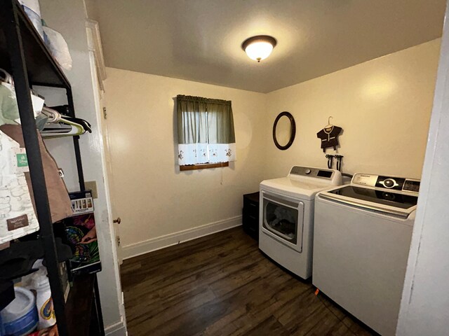 302 Church St, Saint Leo, MN 56264 - clothes washing area featuring baseboards, washer and clothes dryer, laundry area, and dark wood-style flooring