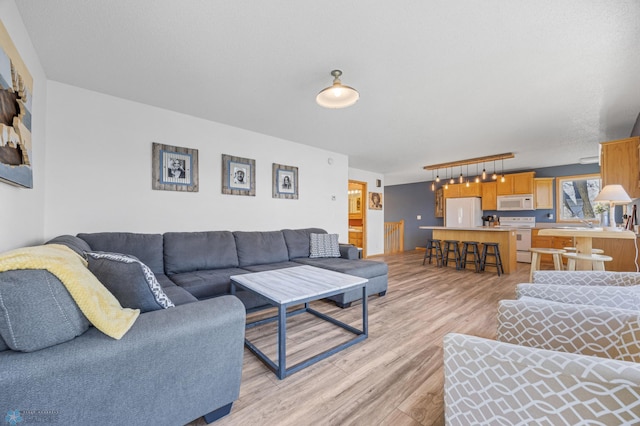 living area with light wood-style flooring