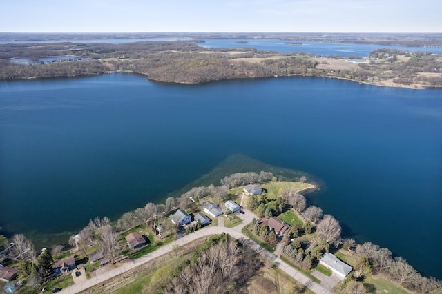 birds eye view of property with a water view and a residential view
