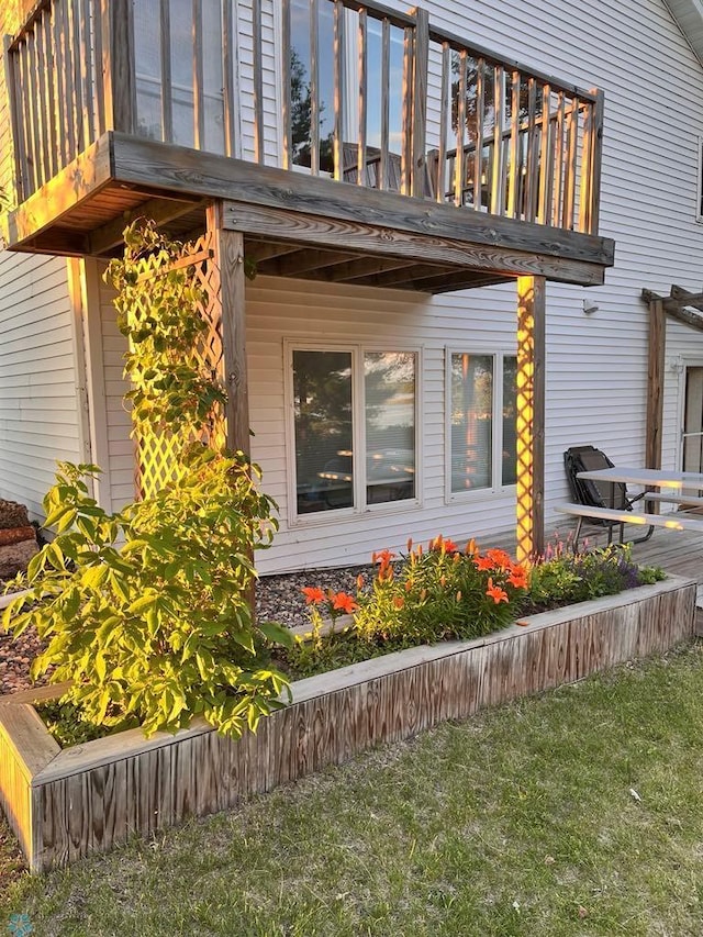view of property exterior with a balcony