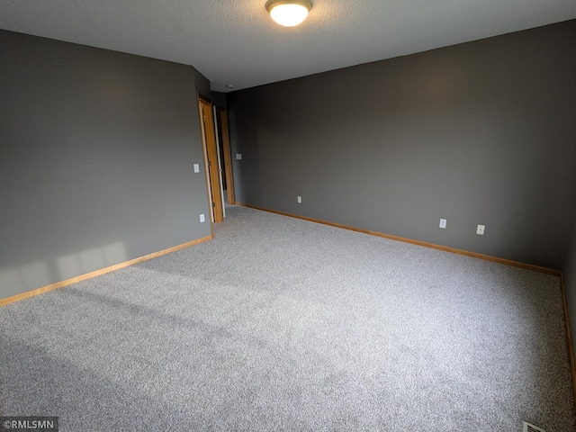 18061 96th Ave N, Maple Grove, MN 55311 - carpeted spare room featuring baseboards