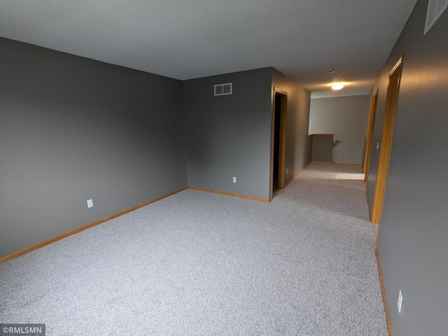 18061 96th Ave N, Maple Grove, MN 55311 - spare room featuring light carpet and baseboards