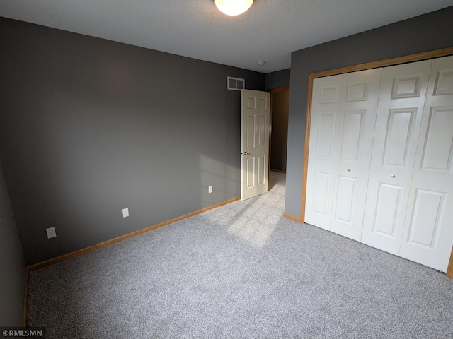 18061 96th Ave N, Maple Grove, MN 55311 - unfurnished bedroom with carpet, baseboards, and a closet
