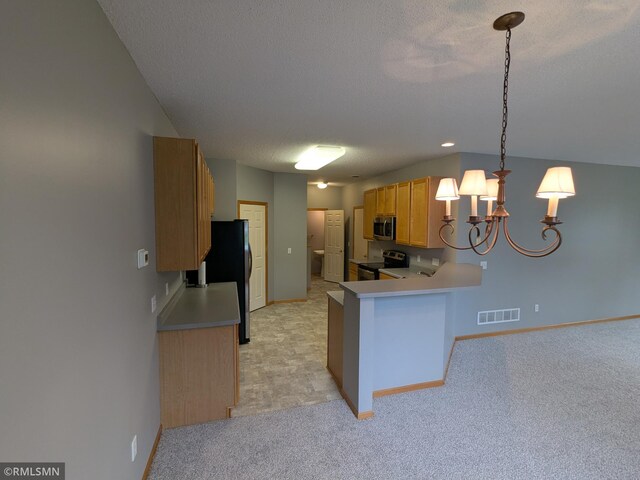 18061 96th Ave N, Maple Grove, MN 55311 - kitchen featuring stainless steel appliances, a chandelier, light countertops, light carpet, and a textured ceiling