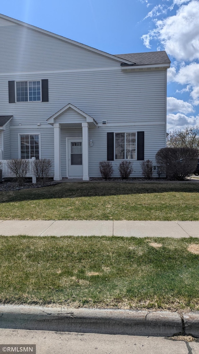 18061 96th Ave N, Maple Grove, MN 55311 - view of front of property with a front lawn