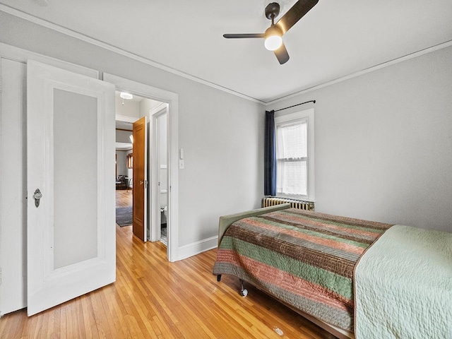 580 Snelling Ave S Unit 4, Saint Paul, MN 55116 - bedroom featuring a ceiling fan, light wood-style flooring, baseboards, and ornamental molding