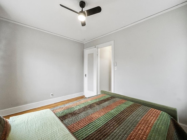 580 Snelling Ave S Unit 4, Saint Paul, MN 55116 - bedroom with baseboards, ceiling fan, crown molding, and wood finished floors