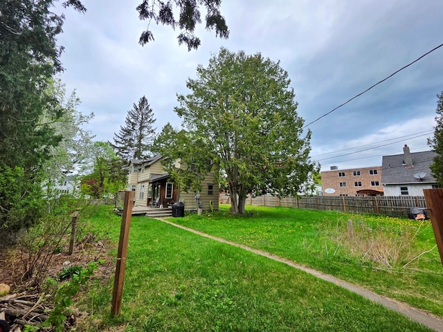 view of yard with a wooden deck
