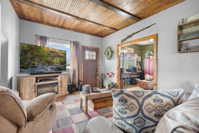 12 Oak Ave SE, Racine, MN 55967 - living room featuring wood ceiling, a glass covered fireplace, wood finished floors, and beam ceiling