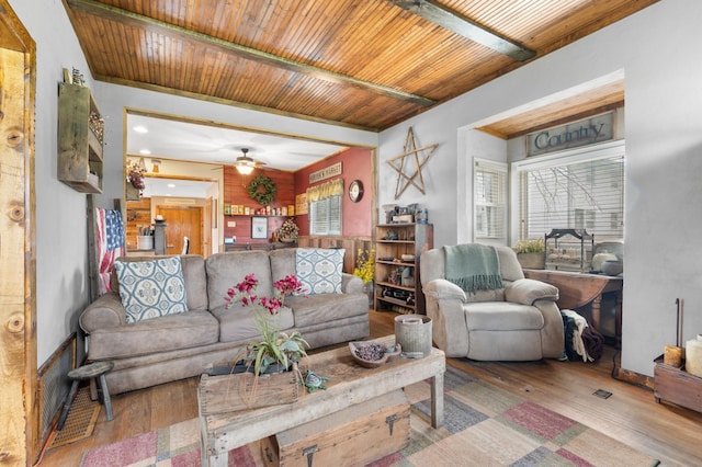 12 Oak Ave SE, Racine, MN 55967 - living room featuring plenty of natural light, hardwood / wood-style flooring, baseboards, a ceiling fan, and wooden ceiling